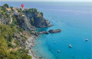 an aerial view of the amalfi coast with a red marker at Villa Antica in Stalettì