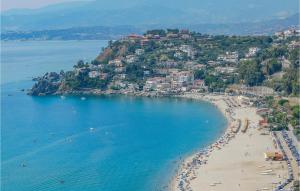 an aerial view of a beach with people on it at Villa Antica in Stalettì