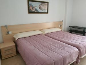 Postel nebo postele na pokoji v ubytování Mar Blau 42