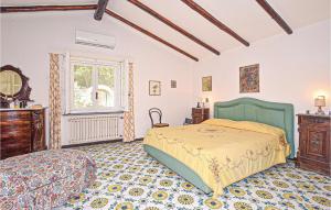 A bed or beds in a room at Laltana