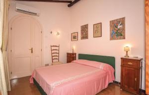A bed or beds in a room at Laltana