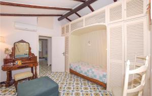 A bed or beds in a room at Laltana