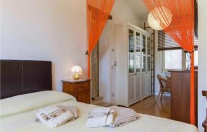 A bed or beds in a room at La Capannina