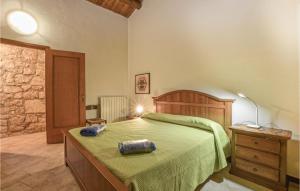 A bed or beds in a room at La Casa Di Adamo
