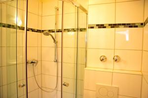 Koupelna v ubytování Hotel Gemini + 37 fotografií