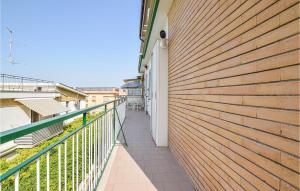 A balcony or terrace at 2 Bedroom Lovely Apartment In Siponto
