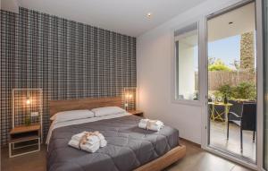 A bed or beds in a room at Villa Stefy