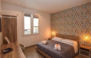 A bed or beds in a room at Villa Stefy
