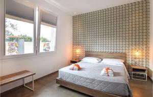 A bed or beds in a room at Villa Stefy