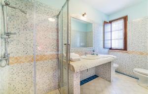 a bathroom with a shower and a sink and a toilet at Il Vigneto in Brufa