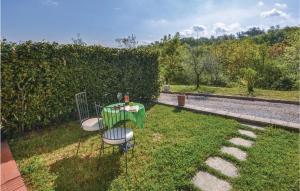 A garden outside Nice Home In Bucine Ar With Kitchen