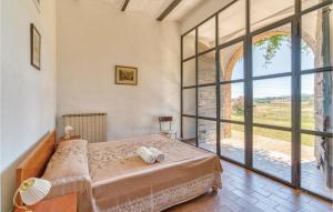 A bed or beds in a room at Tenuta Erbanera