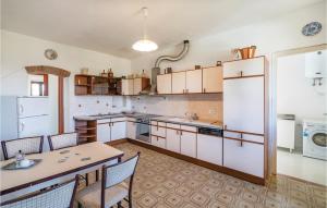 A kitchen or kitchenette at Tenuta Erbanera