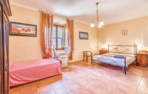 A bed or beds in a room at Tenuta Erbanera