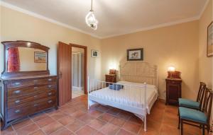 A bed or beds in a room at Tenuta Erbanera