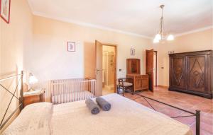A bed or beds in a room at Tenuta Erbanera