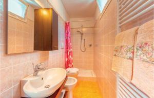 Koupelna v ubytování Casa Tommasi + 3 fotografie
