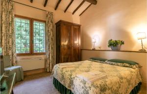 a bedroom with a bed and a window at Casa Di Caccia in Case Riminino