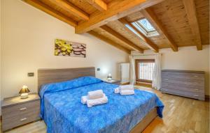 Posteľ alebo postele v izbe v ubytovaní Awesome Apartment In Toscolano Maderno