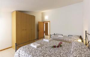 A bed or beds in a room at Casa Fiorini
