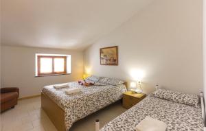 A bed or beds in a room at Casa Fiorini