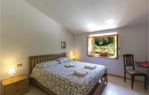 A bed or beds in a room at Casa Fiorini