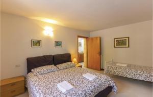 A bed or beds in a room at Casa Fiorini