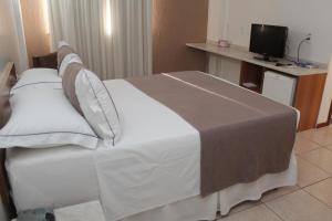 Postel nebo postele na pokoji v ubytování Hotel del Príncipe