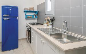 O bucătărie sau chicinetă la La Casa Di Marina 2