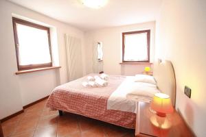 Posteľ alebo postele v izbe v ubytovaní Residence Aquila - Bilo Punta Goà