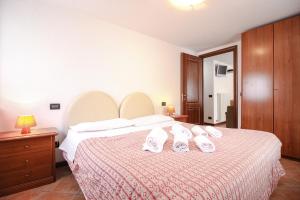 Posteľ alebo postele v izbe v ubytovaní Residence Aquila - Bilo Punta Goà