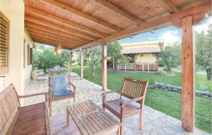 Vonkajšia záhrada v ubytovaní Two-Bedroom Holiday Home In S,maria Di Ricadi -Vv-