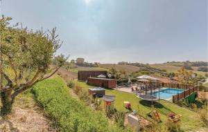 an aerial view of a house with a swimming pool at Casa Federica in Monte San Giusto