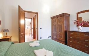 A bed or beds in a room at Il Molino - Casale Il Picchio