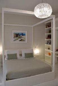 Postel nebo postele na pokoji v ubytování Porta Piccola Luxury Home