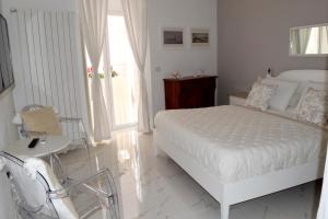 Postel nebo postele na pokoji v ubytování Porta Piccola Luxury Home
