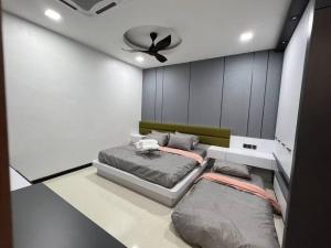 Postel nebo postele na pokoji v ubytování HomeAway Paradise @ Taman Mutiara Bestari