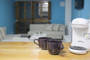 Coffee and tea making facilities at El PISO MAS CÉNTRICO DEL HUMEDO DESAYUNO INCLUIDO