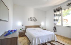 A bed or beds in a room at Selinunte House