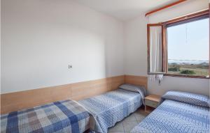 A bed or beds in a room at Appartamento Eden