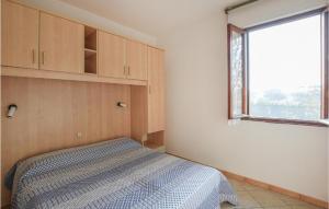A bed or beds in a room at Appartamento Eden