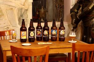a group of bottles of beer sitting on a table at Penzión Brabčák in Vratimov