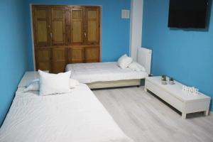 A bed or beds in a room at El PISO MAS CÉNTRICO DEL HUMEDO DESAYUNO INCLUIDO