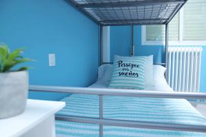 A bed or beds in a room at El PISO MAS CÉNTRICO DEL HUMEDO DESAYUNO INCLUIDO