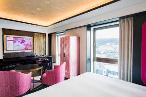 Postel nebo postele na pokoji v ubytování Fauchon Hotel Kyoto