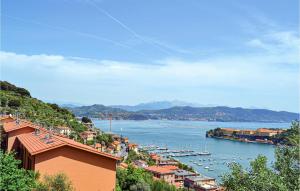 a view of a harbor with boats in the water at Casa Bellavista in Le Grazie