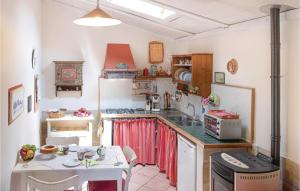 Kuchyň nebo kuchyňský kout v ubytování Il Kiwi