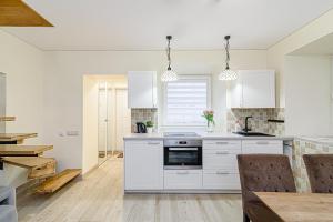 A kitchen or kitchenette at 2 floors New town apartment by URBAN RENT