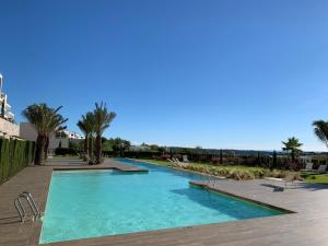 Basen w obiekcie Las Colinas Golf - Naranjo 60 Penthouse lub w pobliżu