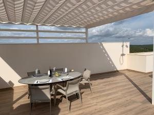 Balkon lub taras w obiekcie Las Colinas Golf - Naranjo 60 Penthouse